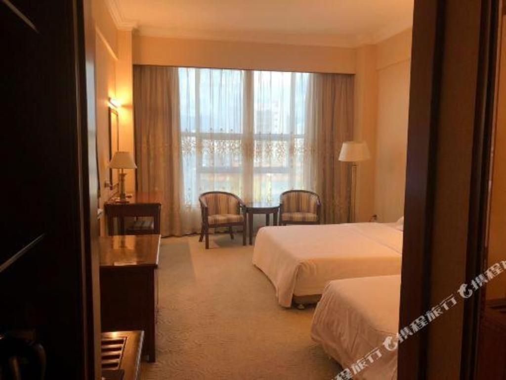 Fenggang Gladden Hotel Tiantangwei Esterno foto