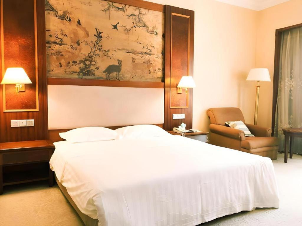 Fenggang Gladden Hotel Tiantangwei Esterno foto