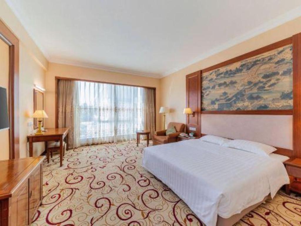 Fenggang Gladden Hotel Tiantangwei Esterno foto