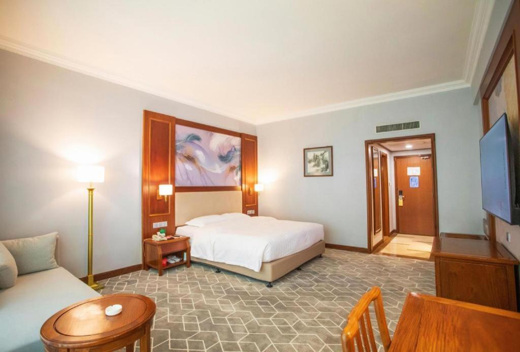 Fenggang Gladden Hotel Tiantangwei Esterno foto
