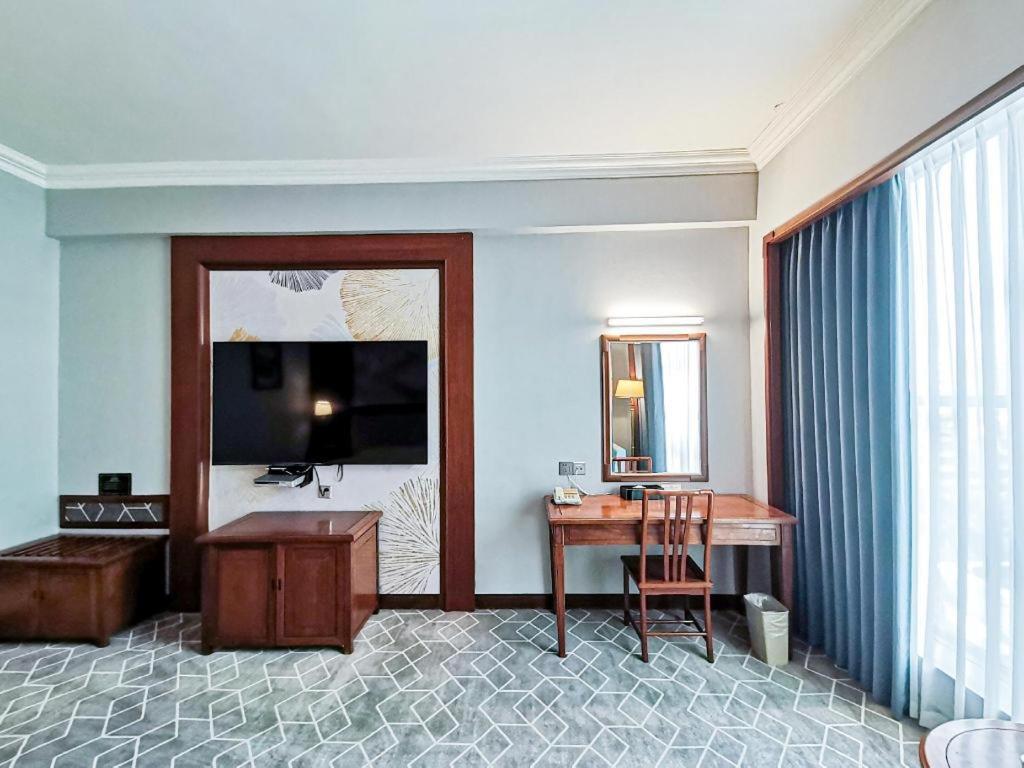 Fenggang Gladden Hotel Tiantangwei Esterno foto