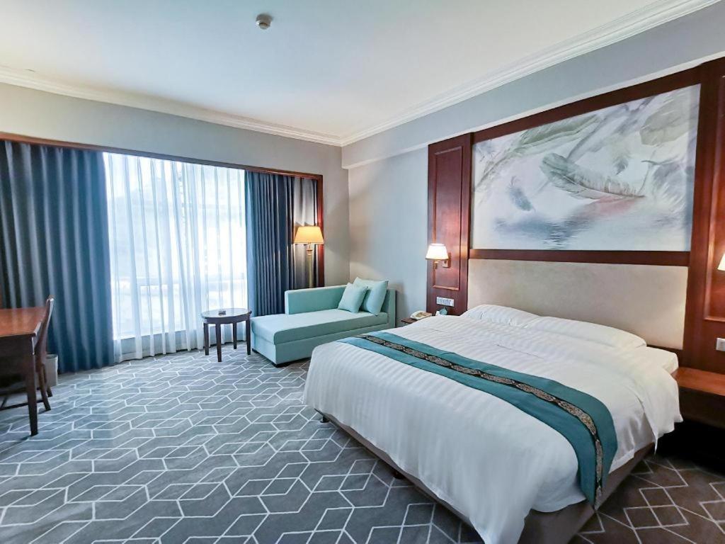 Fenggang Gladden Hotel Tiantangwei Esterno foto