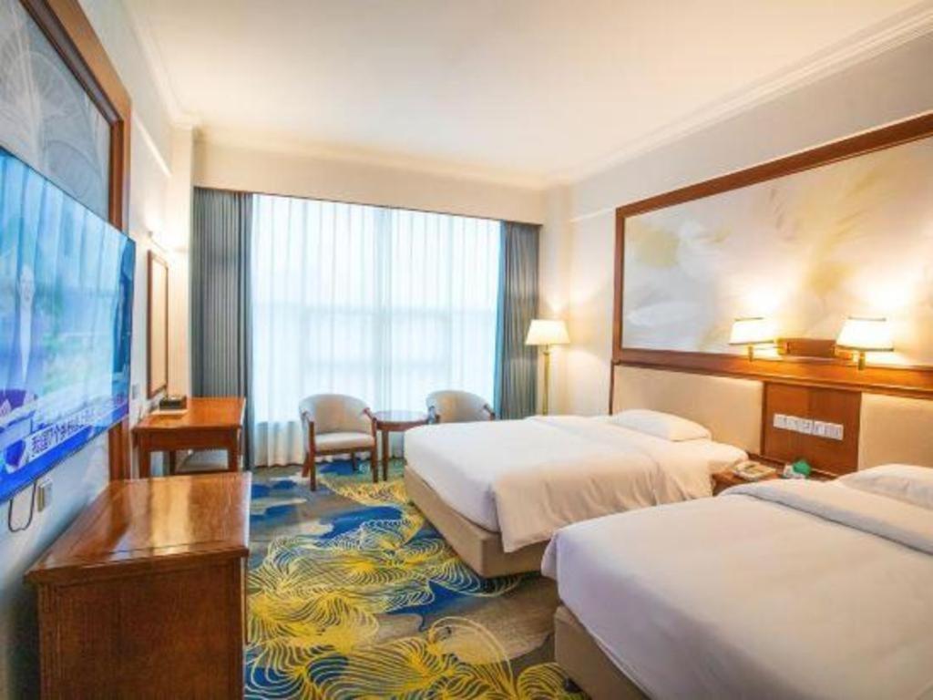 Fenggang Gladden Hotel Tiantangwei Esterno foto