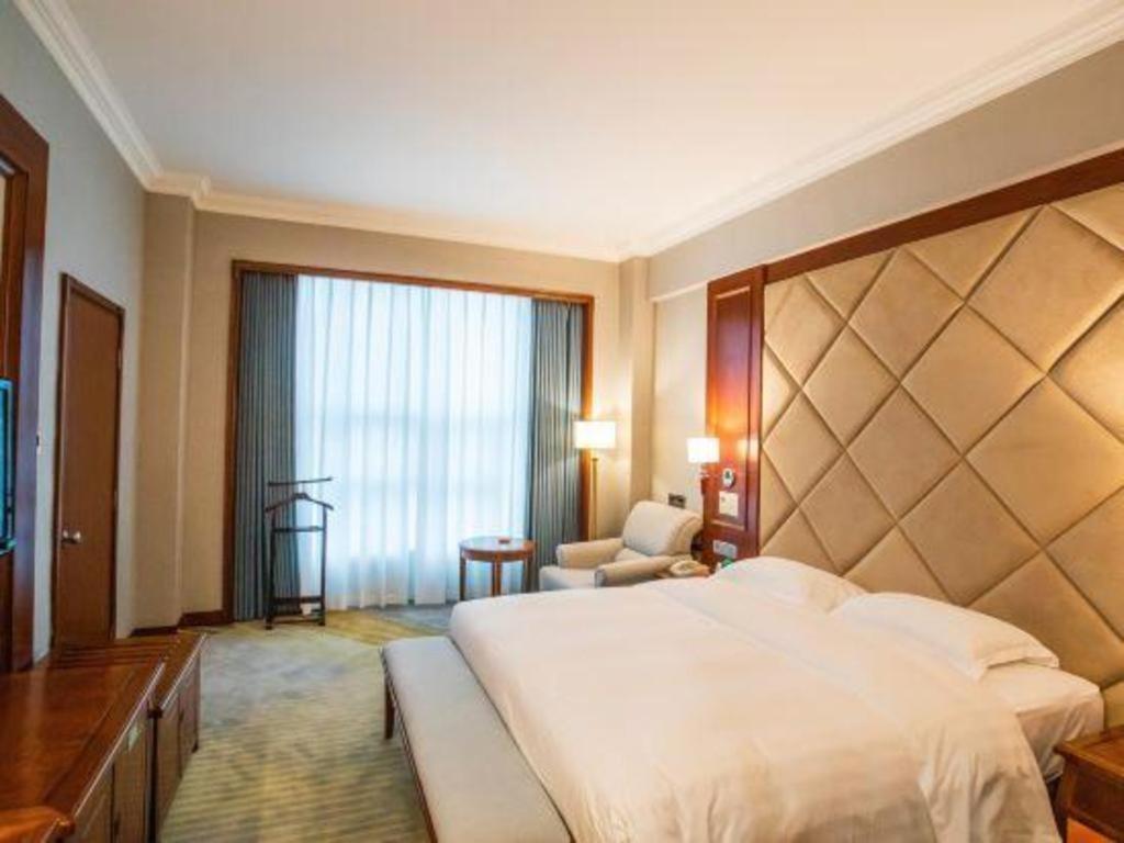 Fenggang Gladden Hotel Tiantangwei Esterno foto