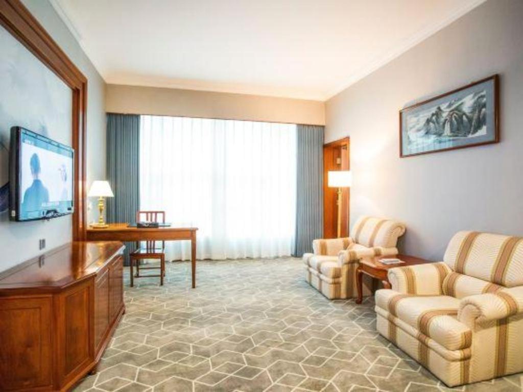 Fenggang Gladden Hotel Tiantangwei Esterno foto