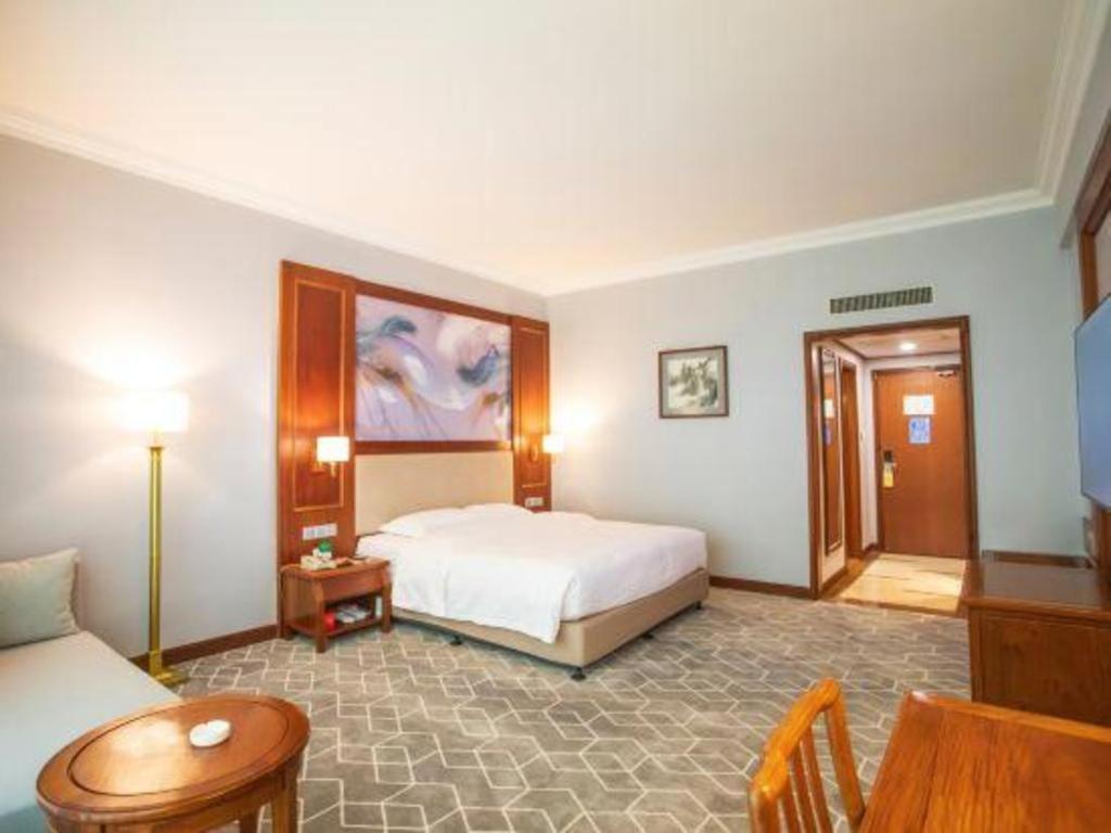 Fenggang Gladden Hotel Tiantangwei Esterno foto