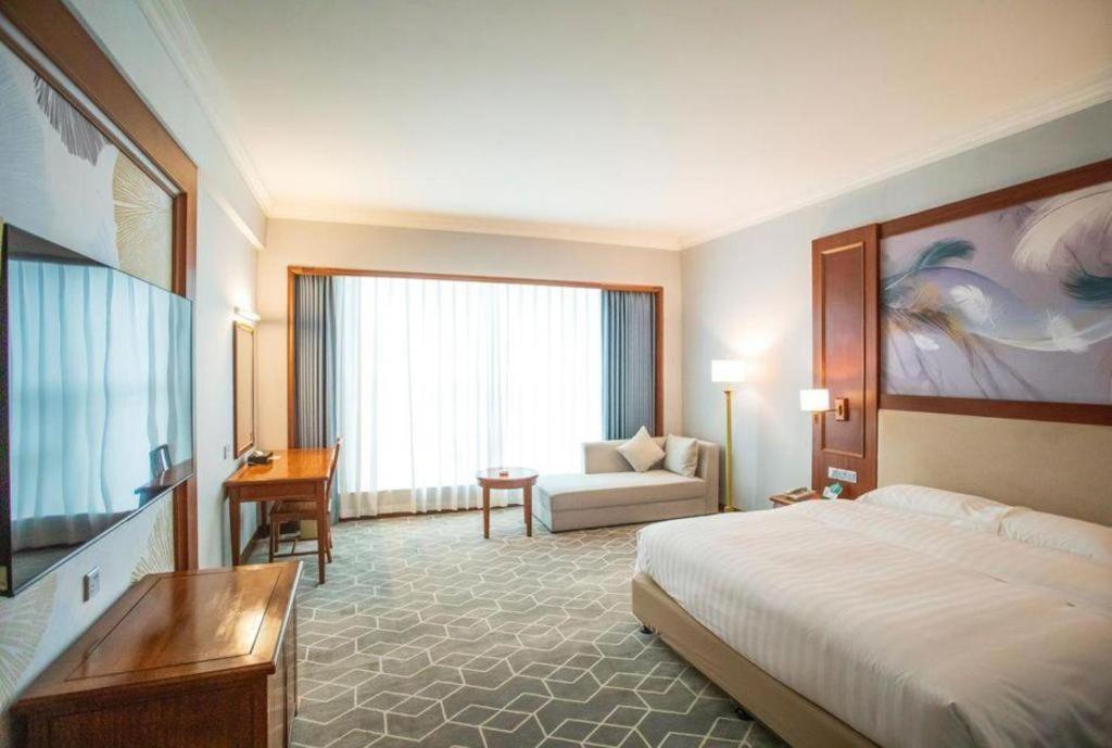 Fenggang Gladden Hotel Tiantangwei Esterno foto