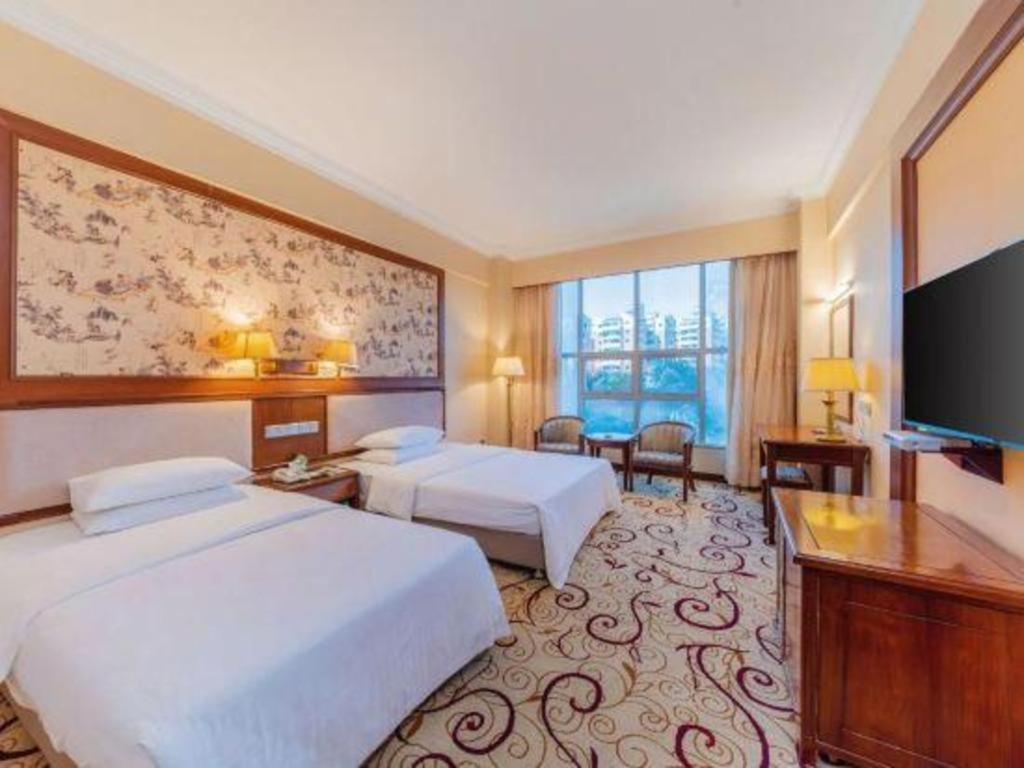 Fenggang Gladden Hotel Tiantangwei Esterno foto