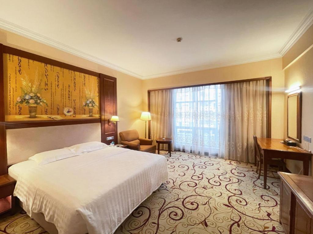 Fenggang Gladden Hotel Tiantangwei Esterno foto