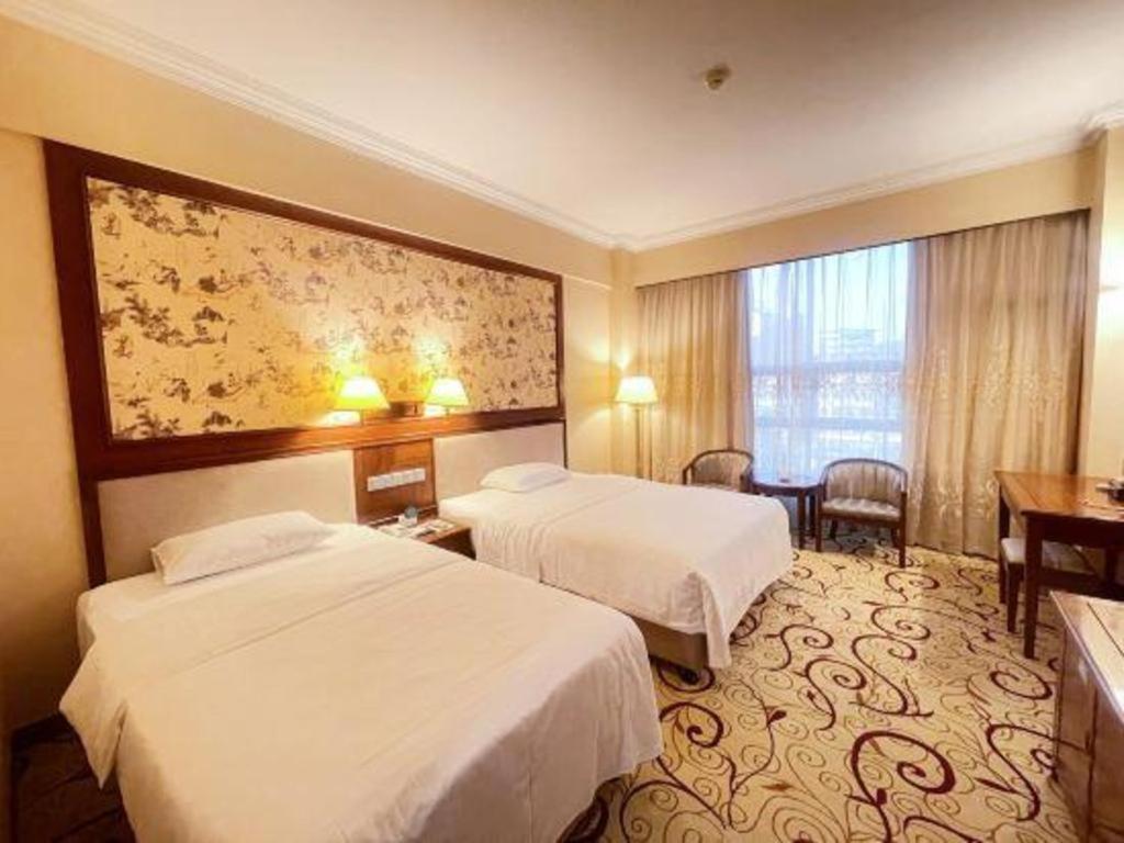Fenggang Gladden Hotel Tiantangwei Esterno foto