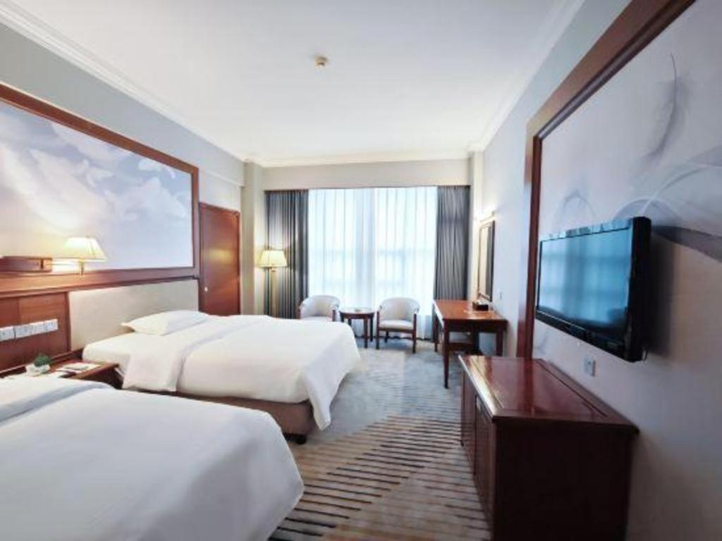 Fenggang Gladden Hotel Tiantangwei Esterno foto