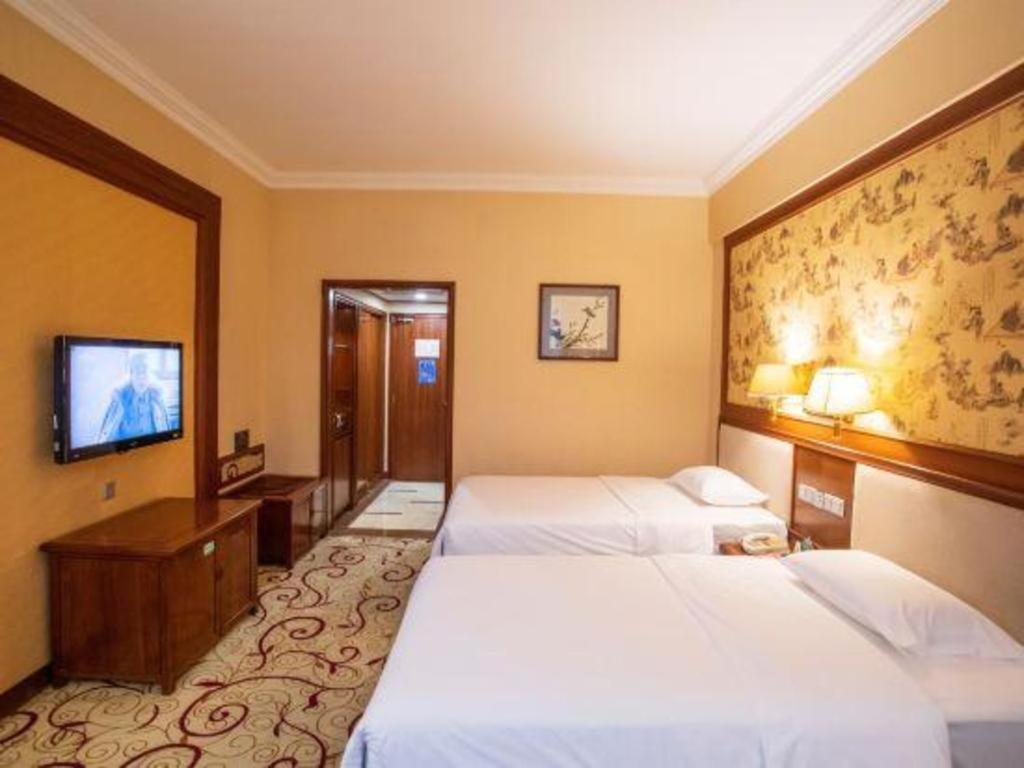 Fenggang Gladden Hotel Tiantangwei Esterno foto