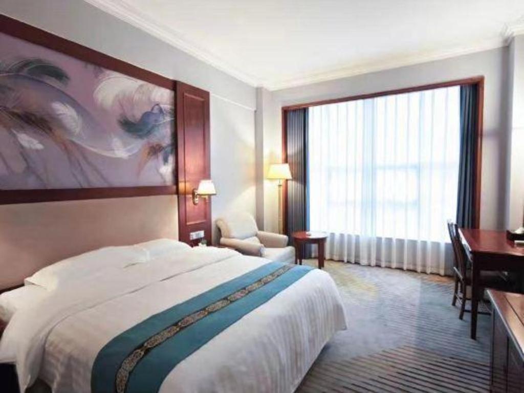Fenggang Gladden Hotel Tiantangwei Esterno foto