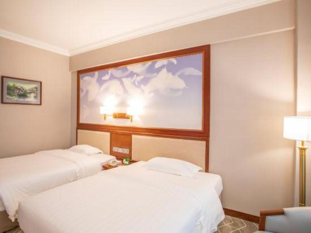 Fenggang Gladden Hotel Tiantangwei Esterno foto