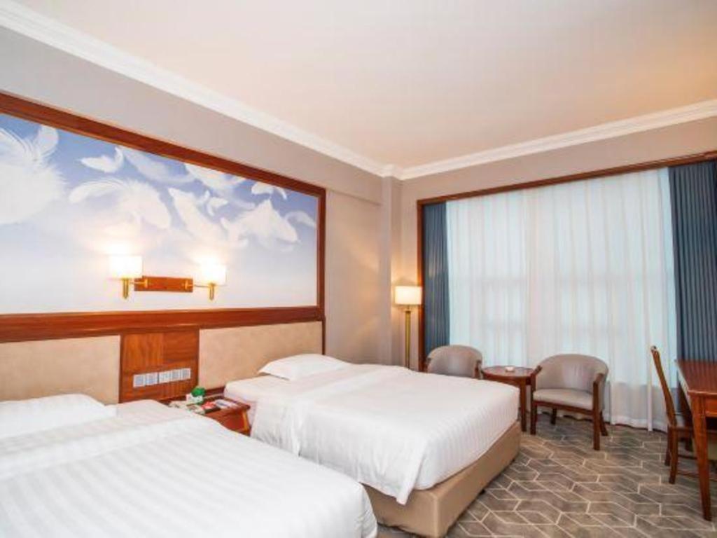 Fenggang Gladden Hotel Tiantangwei Esterno foto