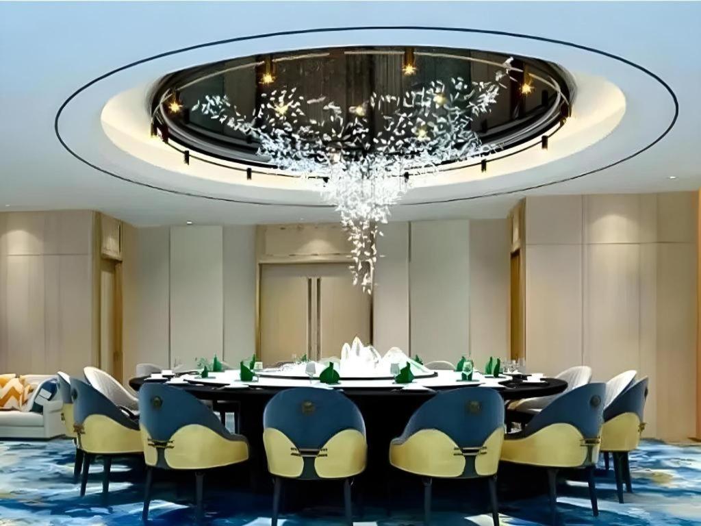 Fenggang Gladden Hotel Tiantangwei Esterno foto
